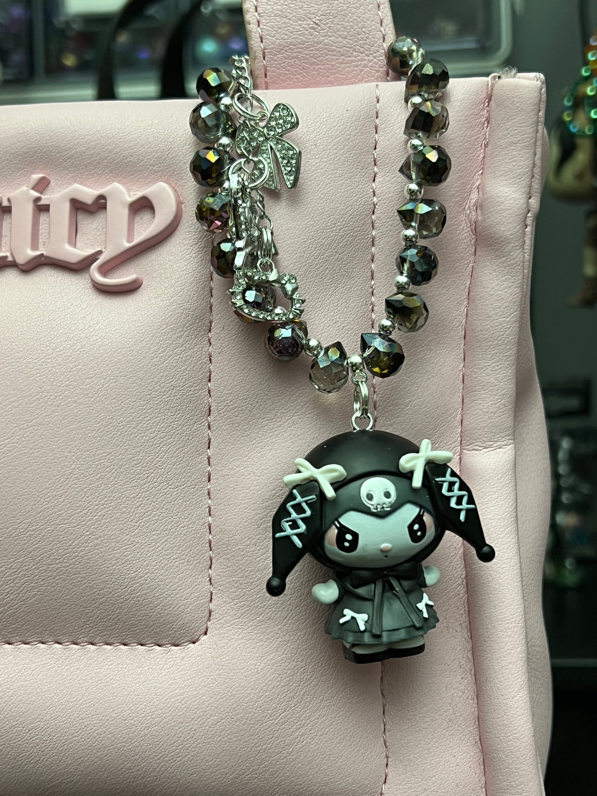 Kuku and melody bag charm