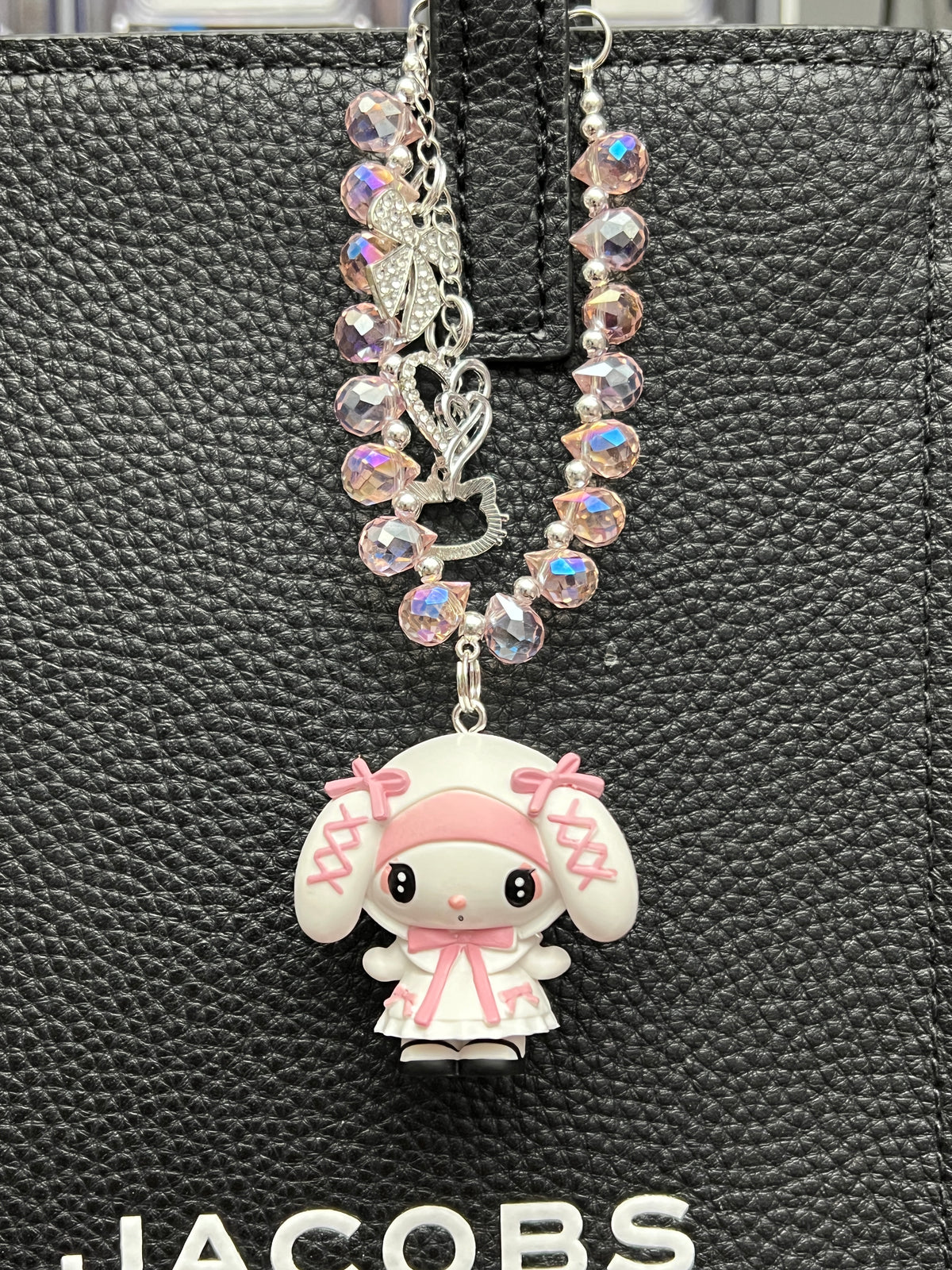 Kuku and melody bag charm