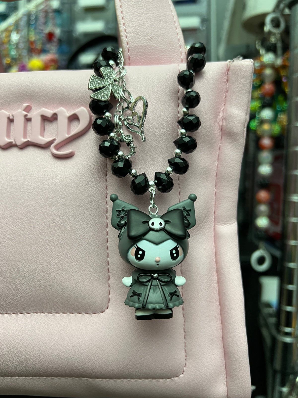 Kuku and melody bag charm