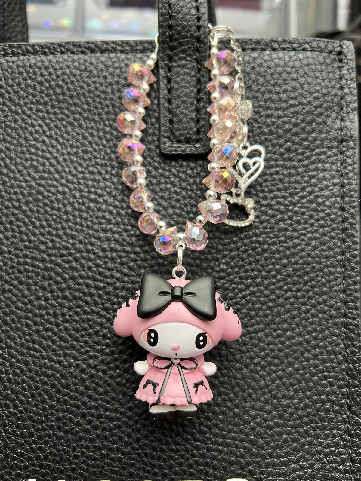 Kuku and melody bag charm
