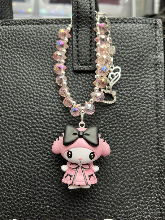Kuku and melody bag charm