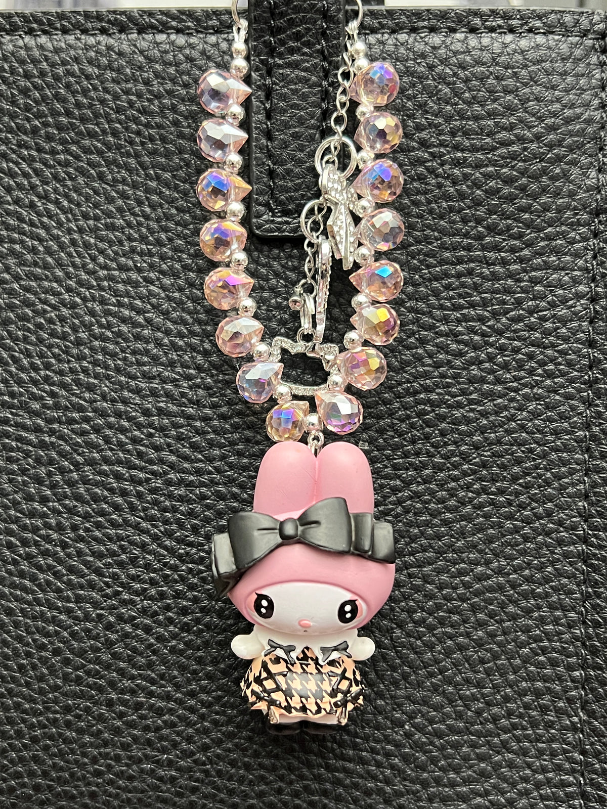 Kuku and melody bag charm